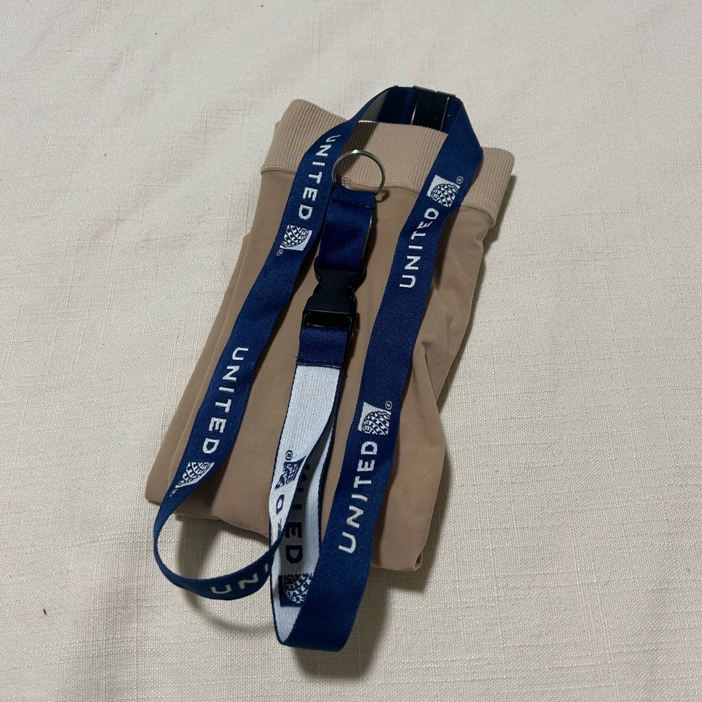 United Blue Lanyard with Beige Pouch